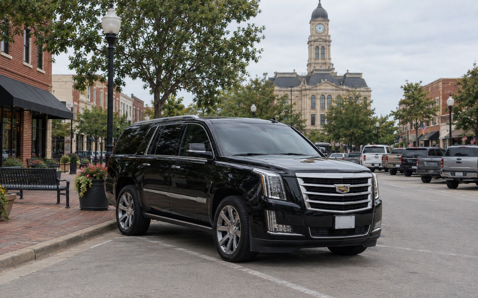 Black Cadillac Escalade parked on the square in historic downtown McKinney